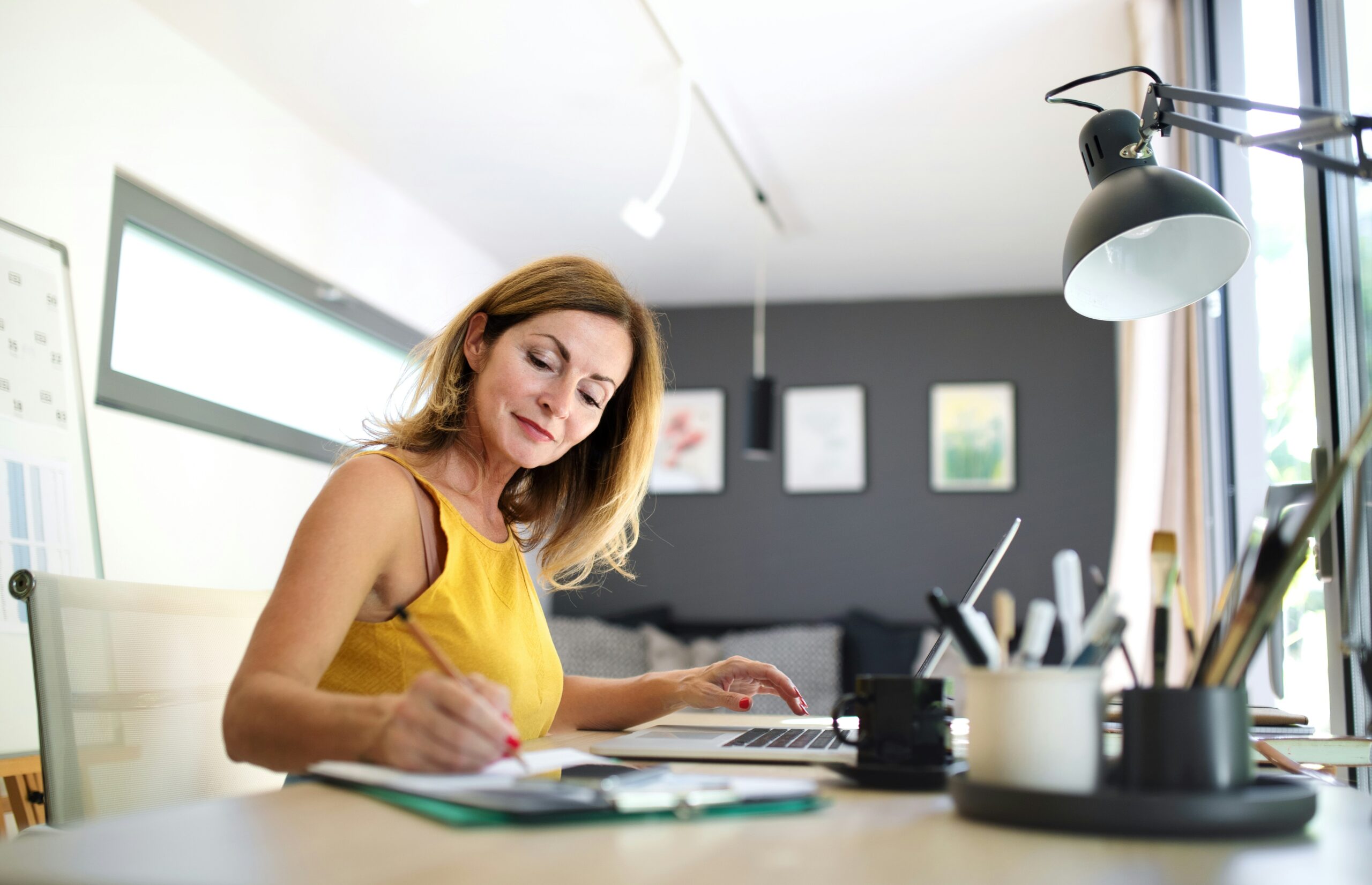 Woman studying Darren and Mikes advice to growing their business